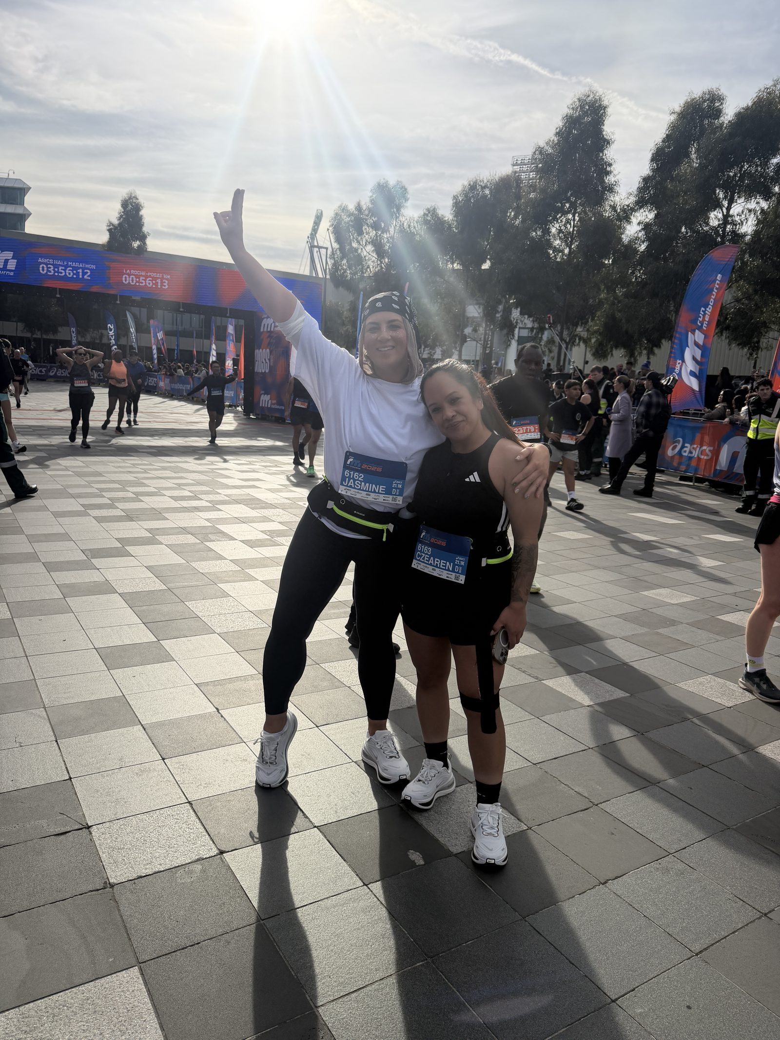 Jasmine and Shaz celebrating finishing their first half marathon at Run Melbourne